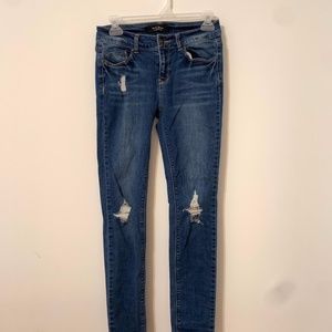 Dark wash ripped skinny jeans